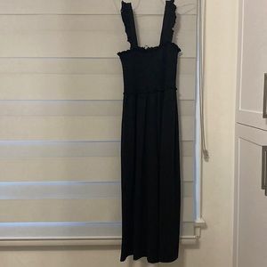 Black jumpsuit with frilled straps